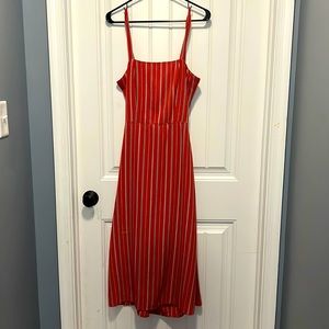 Burnt orange below knee dress with open back/tie